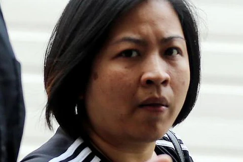 Huỳnh Thị Kiều Trang, 35 tuổi, người đối diện với 103 cáo buộc. (Nguồn: straitstimes)