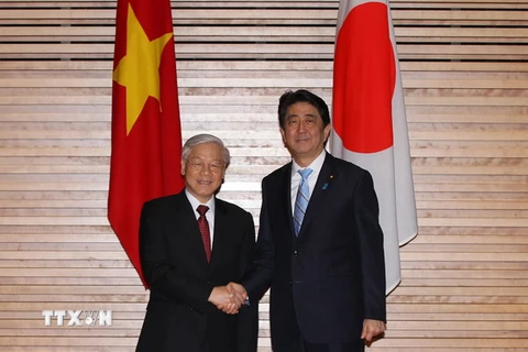 Thủ tướng Nhật Bản Shinzo Abe và Tổng Bí thư Nguyễn Phú Trọng. (Ảnh: Trí Dũng​/TTXVN