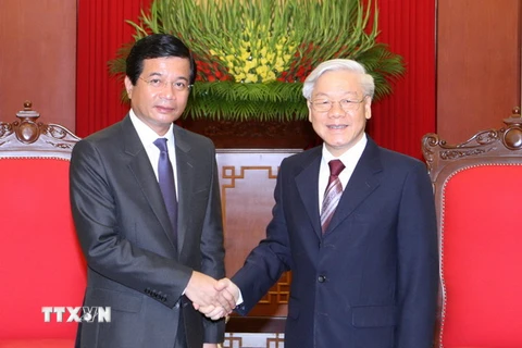 Tổng Bí thư Nguyễn Phú Trọng tiếp Đại sứ Lào Somphone Sichaleune. (Ảnh: Thống Nhất/TTXVN)