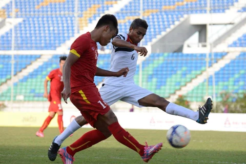 U19 Việt Nam (áo đỏ) giành quyền vào vòng chung kết. (Nguồn: MFF)