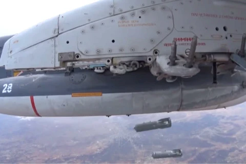Máy bay chiến đấu của Nga tha bom tiêu diệt quân IS. (Nguồn: RT)