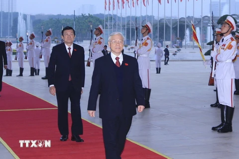 Tổng Bí thư Nguyễn Phú Trọng và Chủ tịch nước Trương Tấn Sang đến dự Đại hội. (Ảnh: TTXVN)