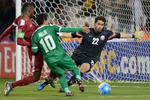 U23 Iraq (áo xanh) đánh bại U23 Qatar. (Nguồn: AFC)