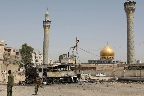 Hiện trường một vụ đánh bom ở đền thờ Sayyida Zeinab, Syria. (Nguồn: AFP)