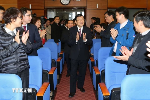Chủ tịch nước Trương Tấn Sang đến thăm, chúc Tết cán bộ, nhân viên Tập đoàn Dầu khí Quốc gia Việt Nam. (Ảnh: Nguyễn Khang/TTXVN)