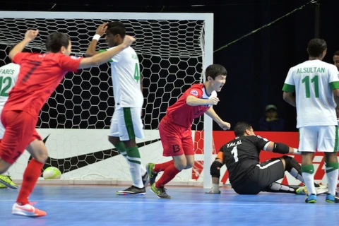 Kyrgyzstan (áo đỏ) giành vé đi tiếp sau khi đánh bại Saudi Arabia. (Nguồn: AFC)