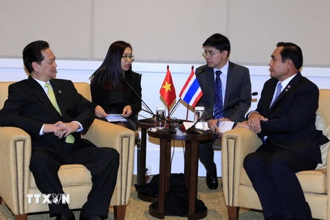 Thủ tướng Nguyễn Tấn Dũng hội kiến với Thủ tướng Thái Lan Prayuth Chan-ocha. (Ảnh: Đức Tám/TTXVN)