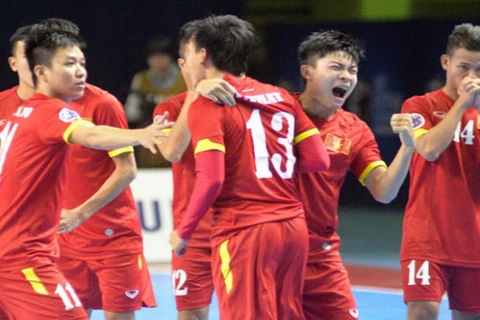Niềm vui của các cầu thủ futsal Việt Nam. (Nguồn: TT)