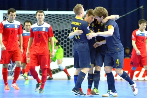 Australia đã vượt qua Kyrgyzstan (áo đỏ) để giành vé cuối cùng dự World Cup Futsal. (Nguồn: AFC)