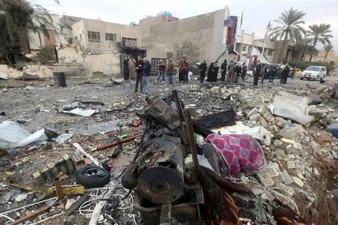 Hiện trường một vụ đánh bom ở Baghdad. (Nguồn: AFP)
