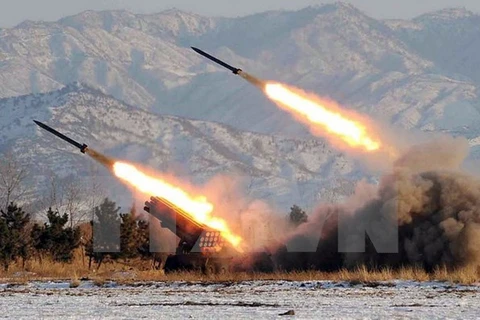 Diễn tập phóng tên lửa tại một địa điểm bí mật ở Triều Tiên. (Nguồn: AFP/TTXVN)