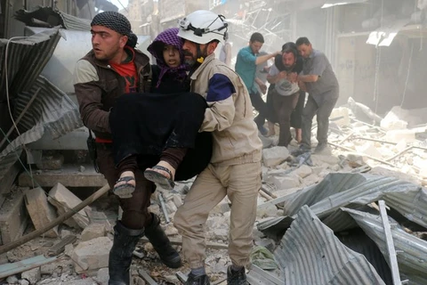 Nhiều người đã bị thương và thiệt mạng sau vụ không kích ở Aleppo. (Nguồn: Getty Images)