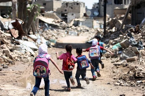 Trẻ em Syria đến trường học. (Nguồn: AP)