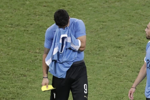 Suarez thành tội đồ khiến Uruguay dừng bước sớm. (Nguồn: Getty Images)