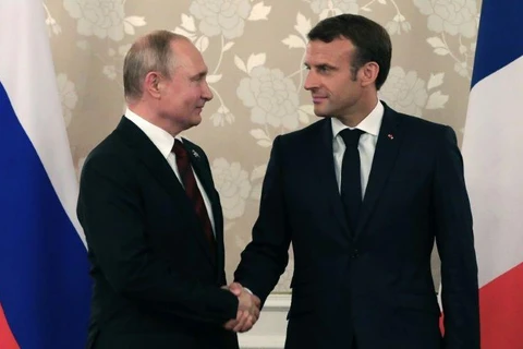 Tổng thống Nga Vladimir Putin và người đồng cấp Pháp Emmanuel Macron. (Nguồn: AFP)