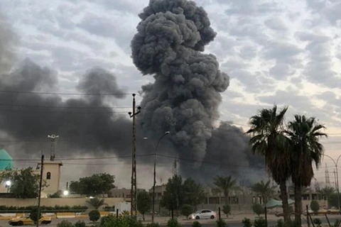 Hiện trường một vụ nổ ở Iraq. (Nguồn: AP)