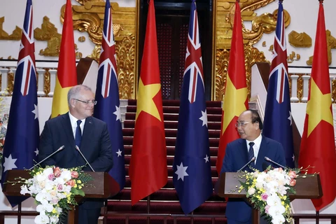 Thủ tướng Nguyễn Xuân Phúc và Thủ tướng Australia Scott Morrison họp báo quốc tế. (Ảnh: Thống Nhất/TTXVN)