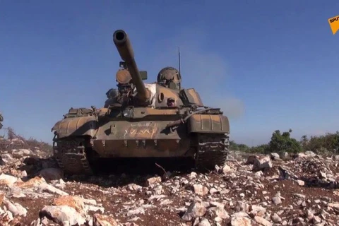 Xe tăng của lực lượng quân chính phủ Syria. (Nguồn: Sputnik)