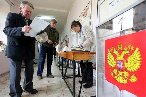 Cử tri Nga đi bỏ phiếu. (Nguồn: TASS)