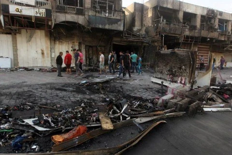 Hiện trường một vụ nổ bom ở Baghdad. (Nguồn: iraqinews)