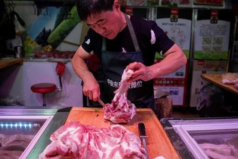 Giá thịt lợn ở Trung Quốc tăng 69,3%. (Nguồn: CNN)