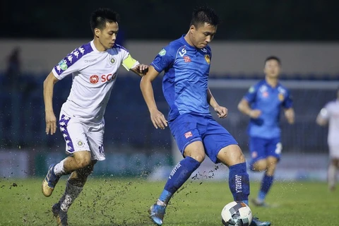 Văn Quyết (áo trắng) giúp Hà Nội FC vượt qua Quảng Nam để giành Cúp Quốc gia 2019. (Nguồn: Zing)