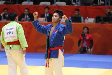 Vũ Ngọc Sơn giành huy chương vàng SEA Games 30 ở môn Kurash. (Ảnh: Vietnam+)