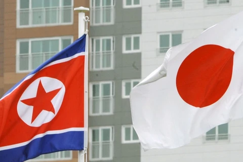 Quốc kỳ của Nhật Bản và Triều Tiên. (Nguồn: Kyodo)