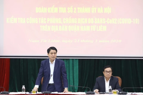 Phó Bí thư Thành ủy, Chủ tịch Ủy ban Nhân dân thành phố Hà Nội Nguyễn Đức Chung phát biểu chỉ đạo tại cuộc làm việc với lãnh đạo quận Nam Từ Liêm. (Ảnh: Văn Điệp/TTXVN)