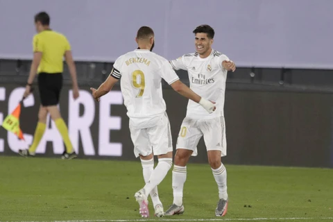 Benzema và Asensio mang chiến thắng về cho Real Madrid. (Nguồn: AP)