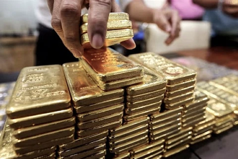 Giá vàng giao ngay tại thị trường châu Á giảm 0,5% xuống 1.933,06 USD/ounce. (Nguồn: miningnewspro)