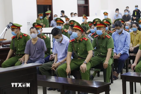 Hình ảnh phiên tòa xét xử sơ thẩm vụ án tại xã Đồng Tâm