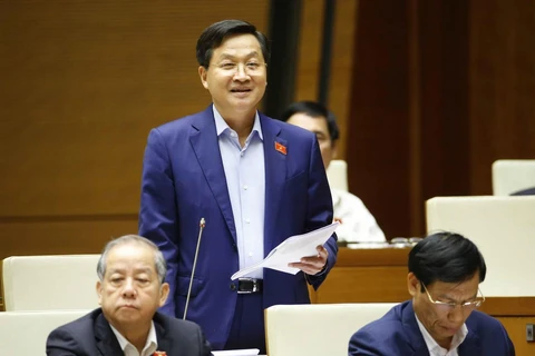 Tổng Thanh tra Chính phủ Lê Minh Khái trả lời chất vấn của các đại biểu Quốc hội. (Ảnh: Doãn Tấn/TTXVN)