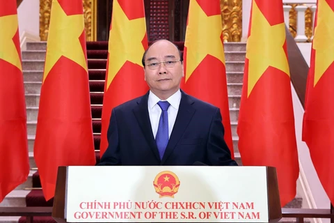 Thủ tướng Nguyễn Xuân Phúc có bài phát biểu chúc mừng Hội chợ Hội chợ Trung Quốc-ASEAN (CAEXPO) lần thứ 17. (Ảnh: Thống Nhất/TTXVN)