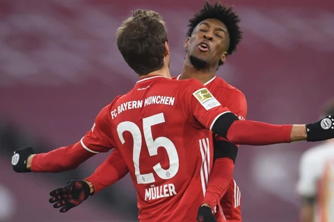 Mueller và Coman tỏa sáng giúp Bayern có điểm trước RB Leipzig. (Nguồn: Bild)
