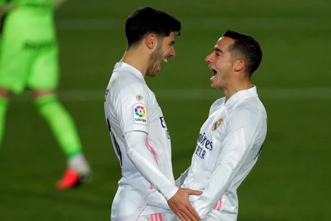 Lucas Vazquez và Marco Asensio mang chiến thắng về cho Real. (Nguồn: AP)