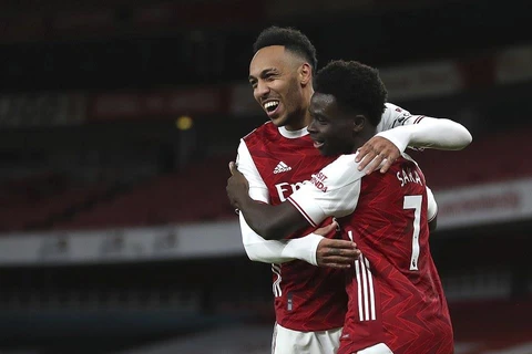 Aubameyang và Bukayo Saka giúp Arsenal chiến thắng. (Nguồn: AP)