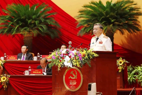 Đại tướng Tô Lâm, Ủy viên Bộ Chính trị, Bí thư Đảng ủy Công an Trung ương, Bộ trưởng Bộ Công an trình bày tham luận. (Ảnh: TTXVN)