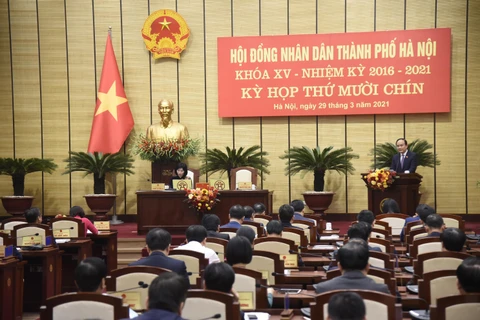 Chủ tịch Hội đồng Nhân dân thành phố Hà Nội Nguyễn Ngọc Tuấn phát biểu khai mạc kỳ họp. (Ảnh: Văn Điệp/TTXVN)