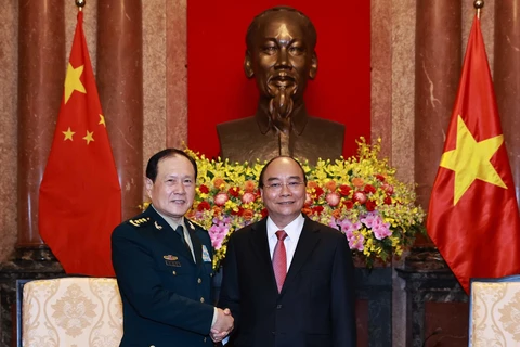 Chủ tịch nước Nguyễn Xuân Phúc tiếp Bộ Quốc phòng Trung Quốc Nguỵ Phượng Hòa. (Ảnh: Thống Nhất/TTXVN)