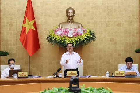 Thủ tướng Phạm Minh Chính phát biểu kết luận phiên họp Chính phủ thường kỳ tháng 6/2021. (Ảnh: Dương Giang/TTXVN)
