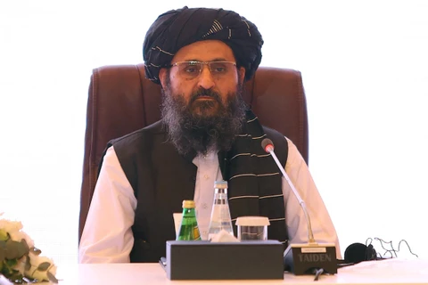 Trưởng đoàn đàm phán của Taliban Mullah Abdul Ghani Baradar trong cuộc đàm phán với đại diện Chính phủ Afghanistan ở Doha, Qatar ngày 18/7. (Nguồn: AFP)