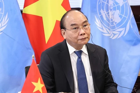 Chủ tịch nước Nguyễn Xuân Phúc dự Hội nghị trực tuyến Thượng đỉnh toàn cầu về COVID-19. (Ảnh: Thống Nhất/TTXVN)