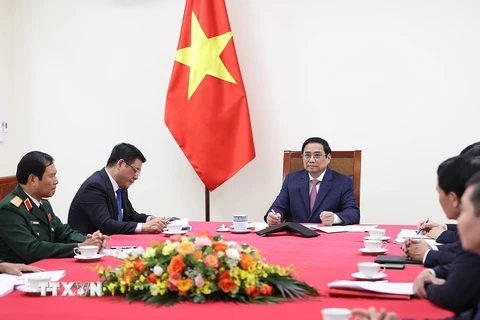Hình ảnh Thủ tướng Phạm Minh Chính điện đàm với Thủ tướng Trung Quốc