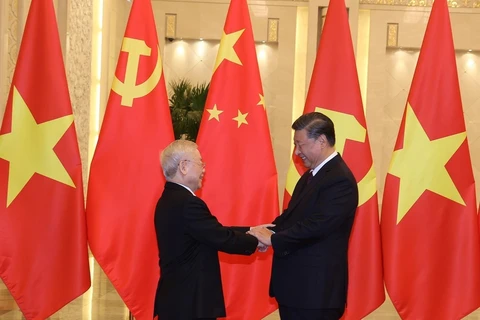 Tổng Bí thư, Chủ tịch Trung Quốc Tập Cận Bình và Tổng Bí thư Nguyễn Phú Trọng. (Ảnh: Trí Dũng/TTXVN)