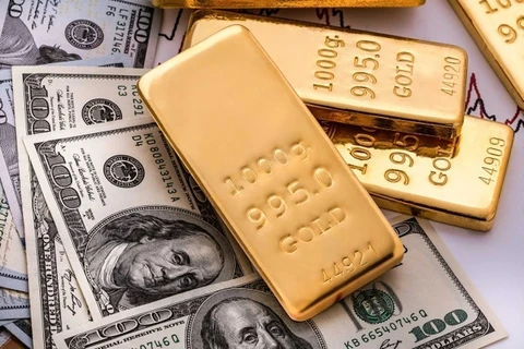 Đồng USD yếu đẩy giá vàng châu Á đi lên trong phiên giao dịch 5/1