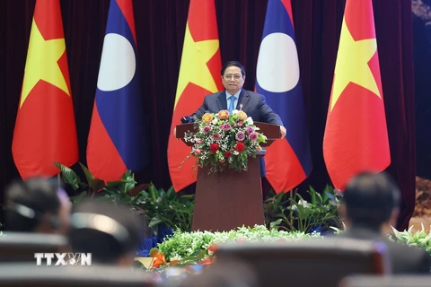Hình ảnh Thủ tướng dự Hội nghị hợp tác đầu tư Việt Nam-Lào