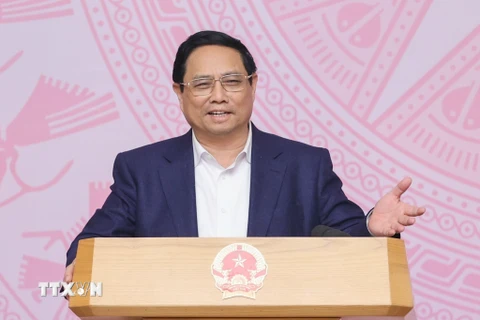Thủ tướng Phạm Minh Chính, Chủ tịch Ủy ban phát biểu kết luận phiên họp. (Ảnh: Dương Giang/TTXVN)