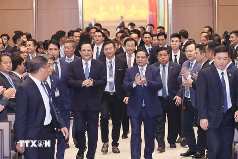 Thủ tướng Việt Nam và Lào dự Hội nghị hợp tác đầu tư giữa hai nước