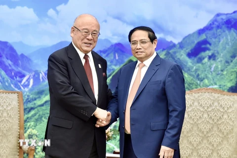 Thủ tướng Phạm Minh Chính tiếp ông Takebe Tsutomu, Cố vấn đặc biệt Liên minh Nghị sỹ hữu nghị Nhật Bản-Việt Nam. (Ảnh: Dương Giang-TTXVN)